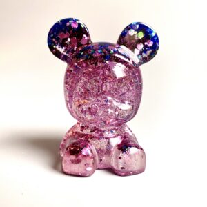 Figurine bébé violet résine